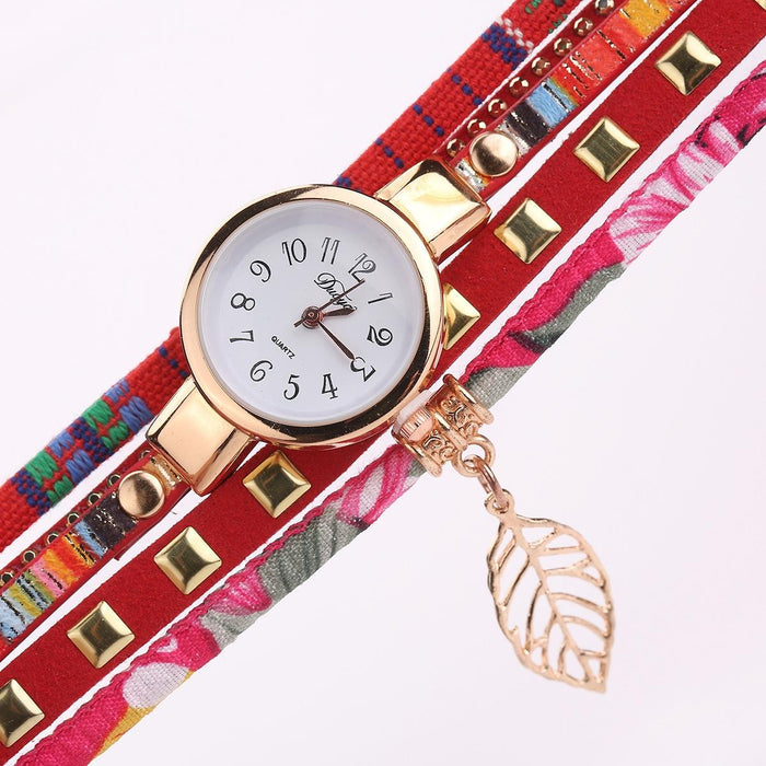 Women Quartz Bracelet Watch With Leaf Shape Pendant