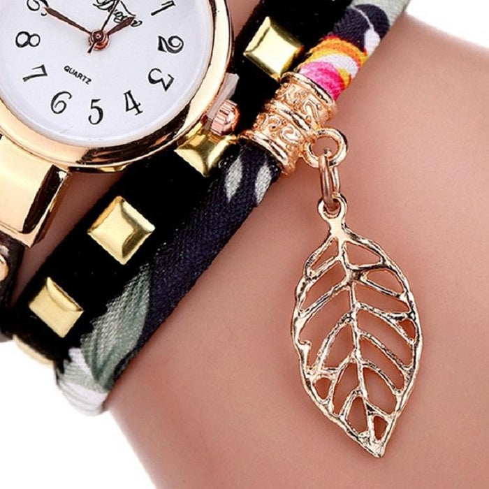 Women Quartz Bracelet Watch With Leaf Shape Pendant