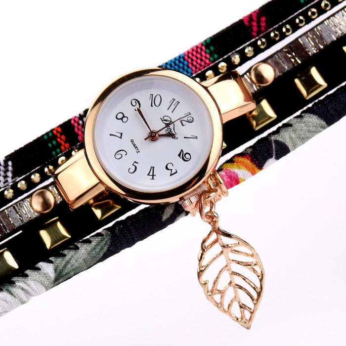 Women Quartz Bracelet Watch With Leaf Shape Pendant